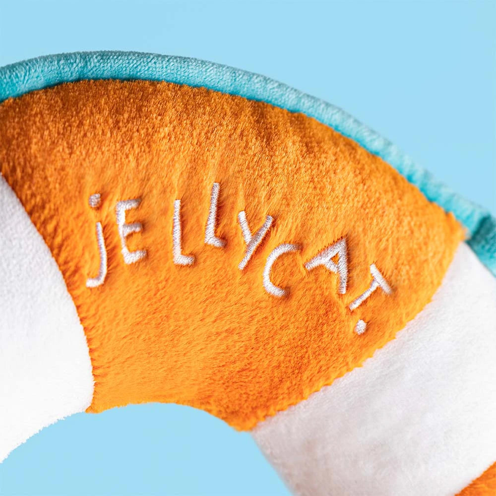 Close-up of the Amuseables Life Ring SS26 showing its cheerful face and high-quality soft fabric, ideal for comfort.