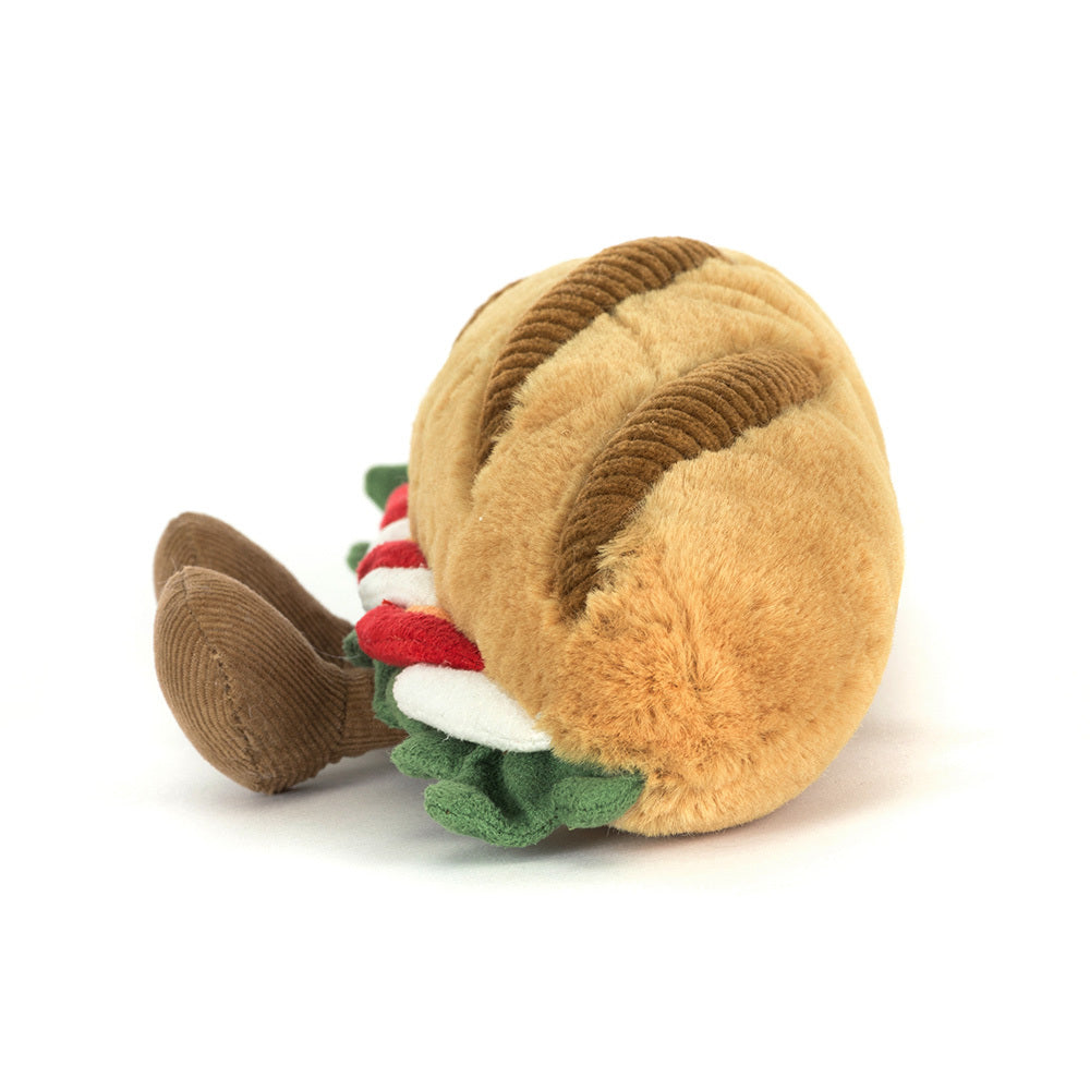 Amuseables Caprese Baguette in a playful setting - this delightful plush brings Italian charm to playtime for young collectors.