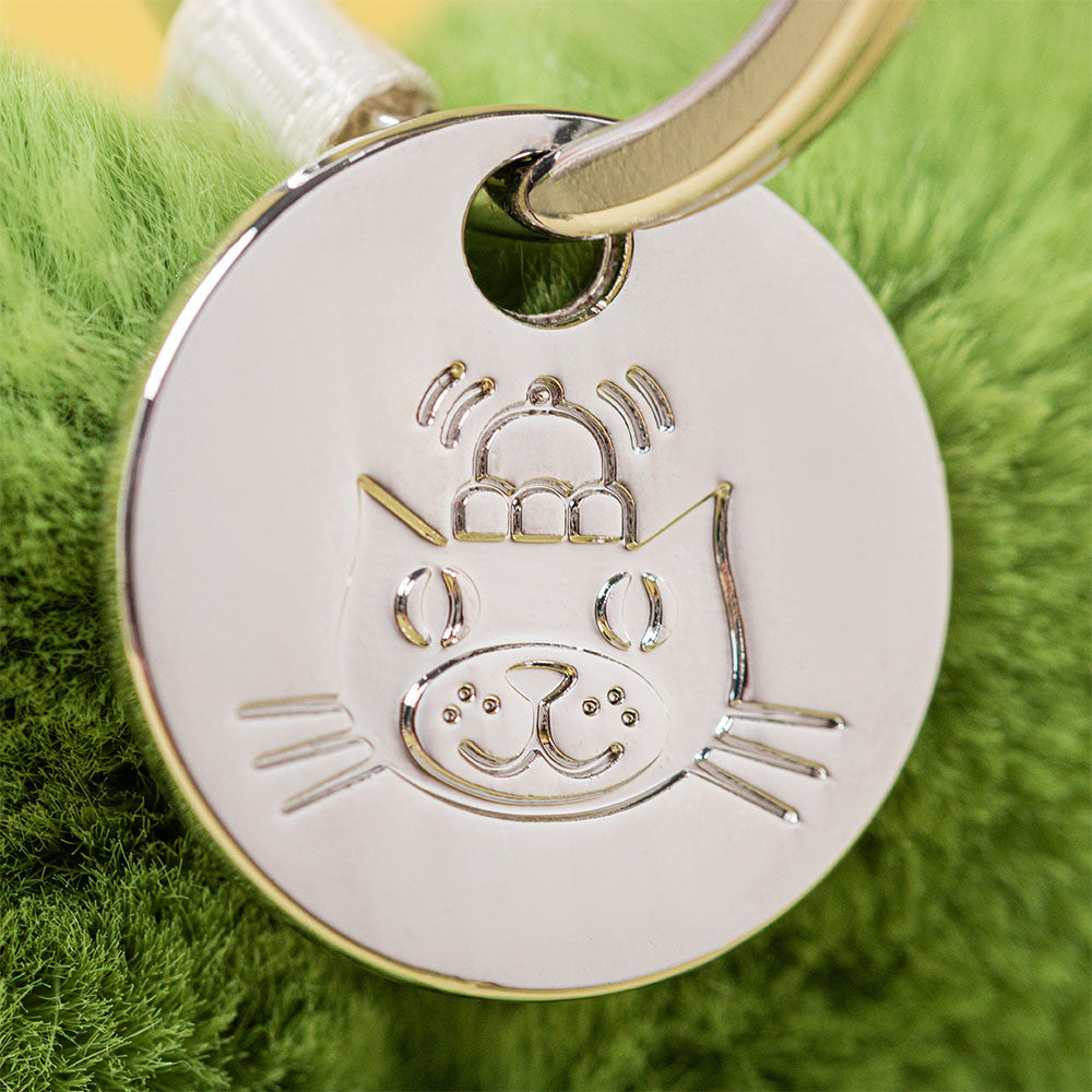 Close-up view of Amusables Siofra Shamrock Bag Charm highlighting its hard eyes and adorable styling.