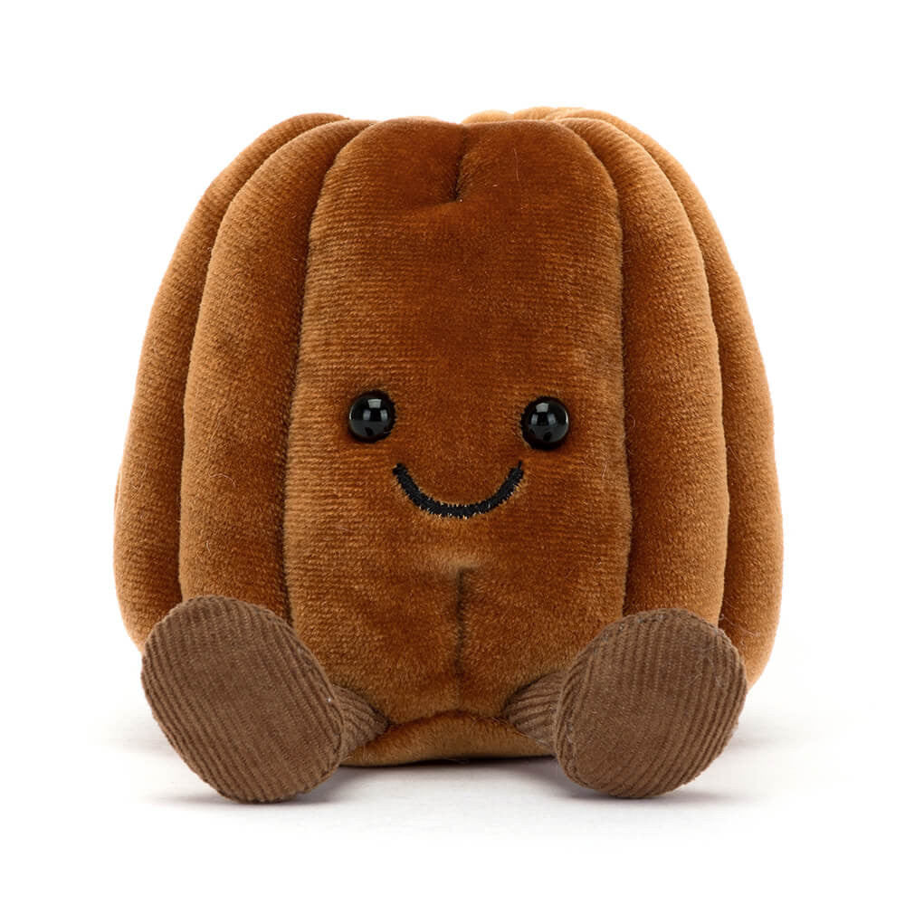 Front view of Amuseables Carole Canelé plush by JellyCat, showcasing its cheerful expression and rounded shape.