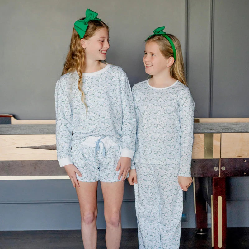 Stella Girls' 100% Peruvian Pima Cotton Sweatshirt & Shorts Set - Snow Capped Mountains worn by a happy girl playing outside.