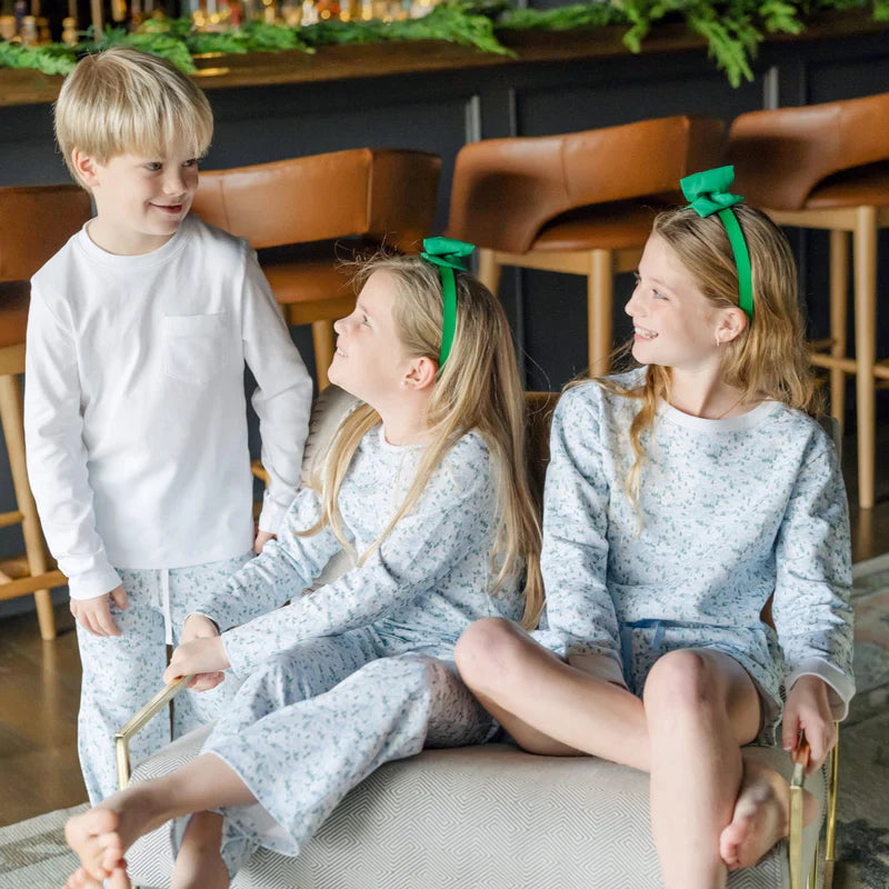 Flat lay of Stella Girls' 100% Peruvian Pima Cotton Sweatshirt & Shorts Set - Snow Capped Mountains with accessories perfect for tweens.