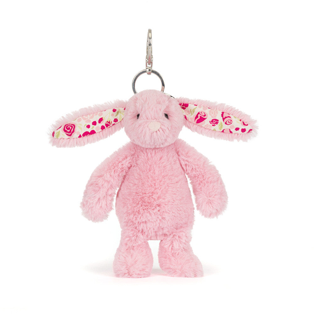 Blushkin Blossom Bunny Bag Charm by JellyCat, showcasing a delightful pink bunny keychain with long floppy ears.