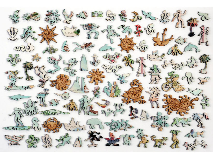 Assorted unique pieces from Captiva and Sanibel Islands wooden puzzle by Liberty Puzzles, highlighting whimsical shapes and beach themes.