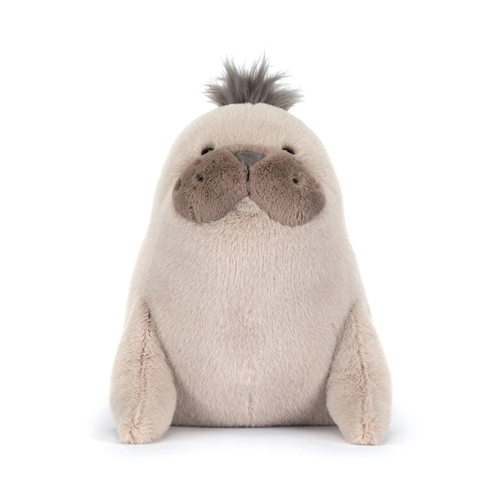 Roarwell Sea Lion SS26 from JellyCat sitting serenely, embodying its theatrical character design and soft plush feel.