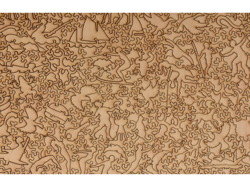 A collection of intricately cut puzzle pieces displaying a variety of lake-related shapes, part of the 'Summer at the Lake' puzzle by Liberty Puzzles.