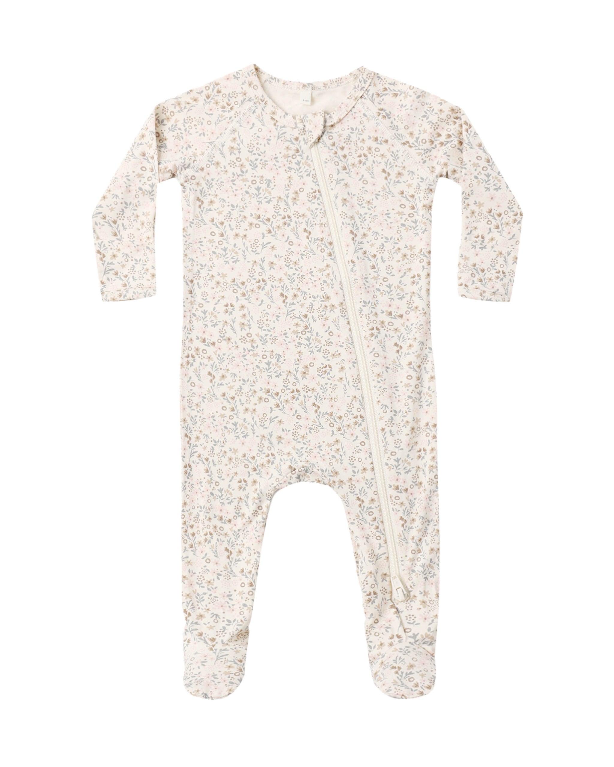 A long-sleeve baby footed one-piece sleeper with an all-over delicate floral print in soft beige, cream, and muted blue tones, featuring a front zipper closure.