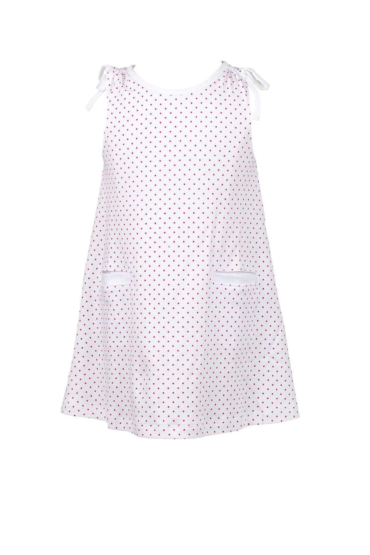 Dottie Sleeveless Dress by The Proper Peony, featuring a playful white fabric with red polka dots and cute tie straps at the shoulders, ideal for stylish summer outings.