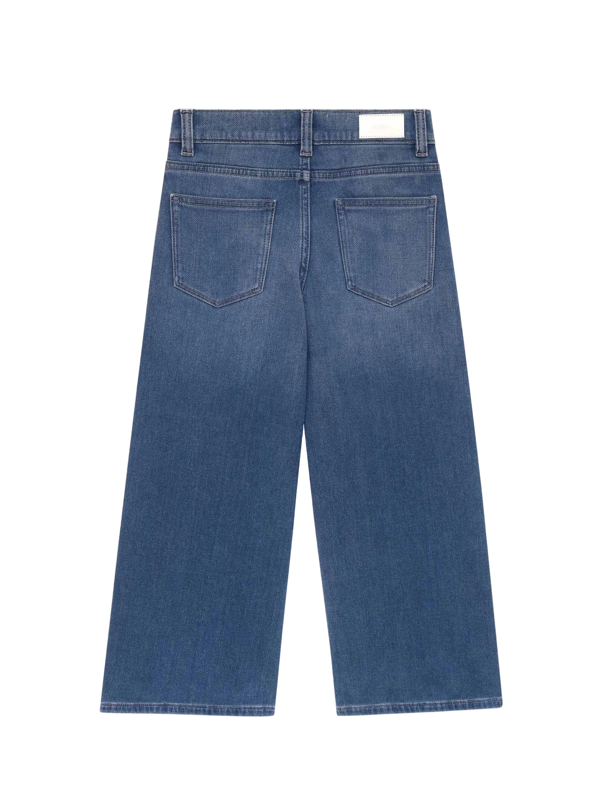Blue jeans on a light gray background