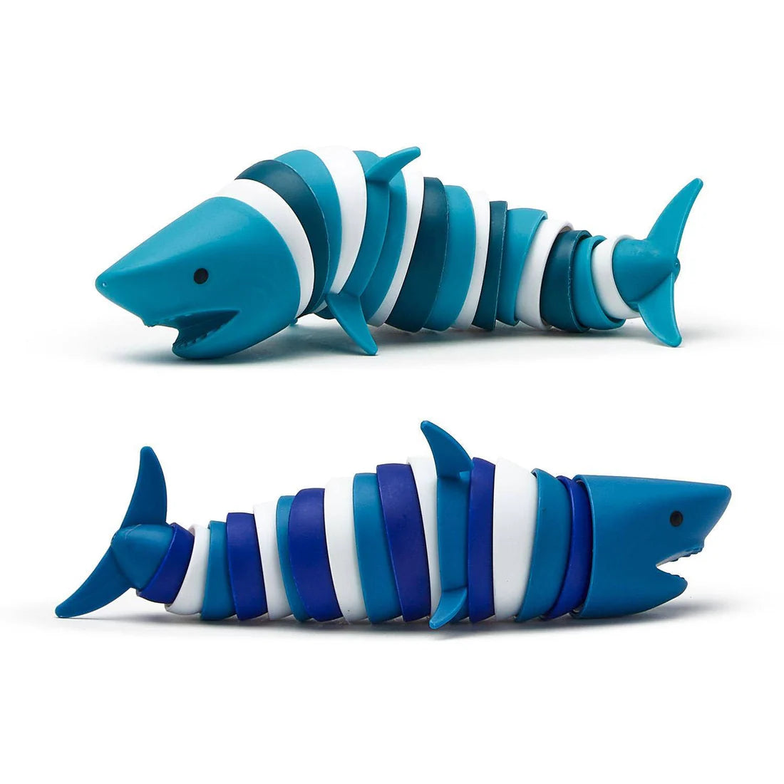 Adorable Shark Fidget Toy from Cupcakes and Cartwheels, showcasing a stylish twisted shape in blue and white, perfect for fidgeting fun.