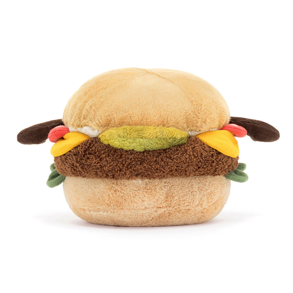 Side view of the Amuseables Burger stuffed burger toy by JellyCat, showcasing its fluffy shape and vibrant details of the burger ingredients.