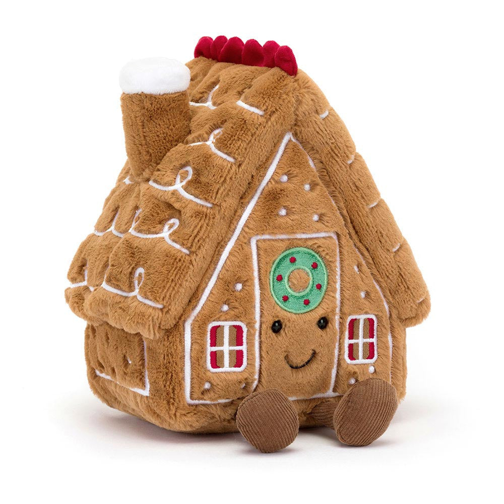 JellyCat's Amusable Gingerbread House, a delightful plush toy that brings holiday cheer, making it a thoughtful gift for birthdays or any occasion.