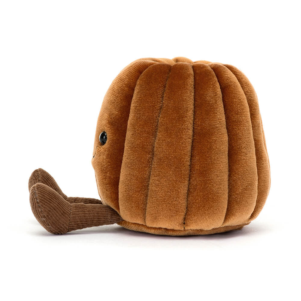 Side view of the Amuseables Carole Canelé plush by JellyCat, highlighting its adorable design and cozy brown fabric.