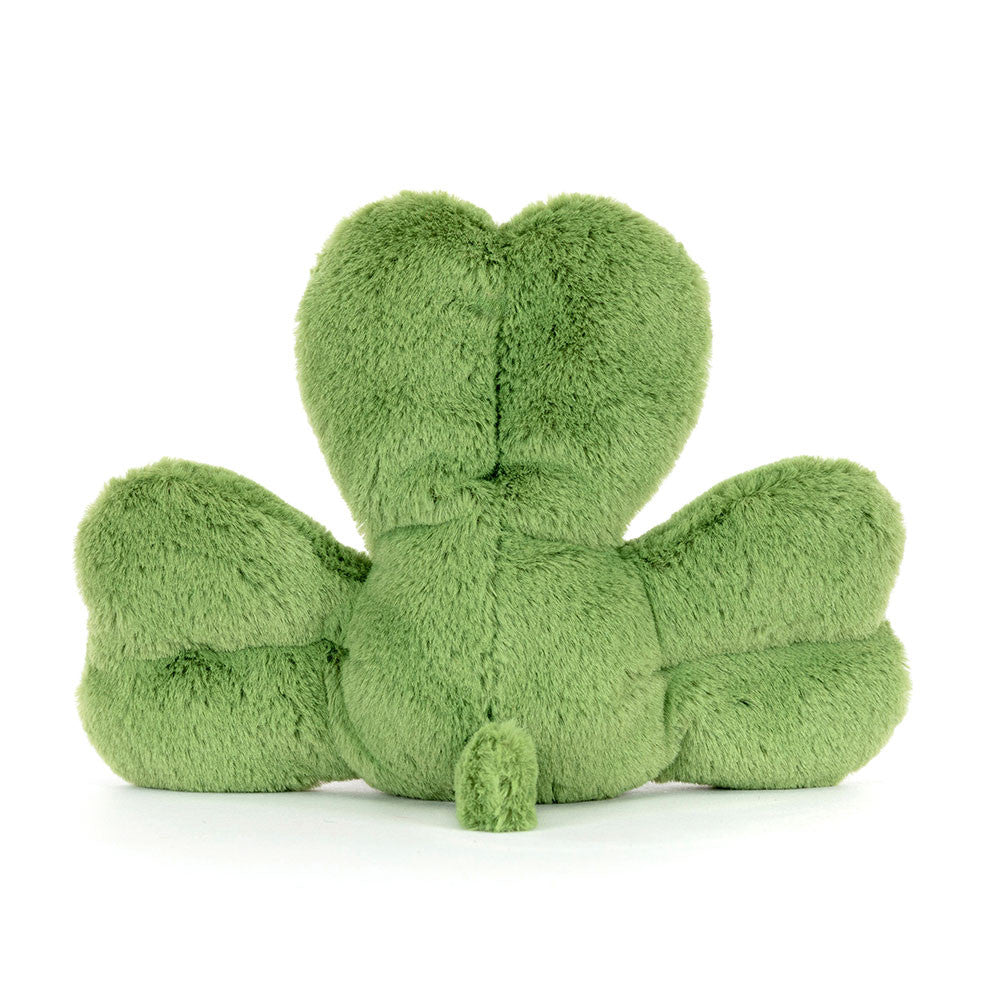 Amuseables Siofra Shamrock sitting on a shelf, ready to charm any space with its adorable look.