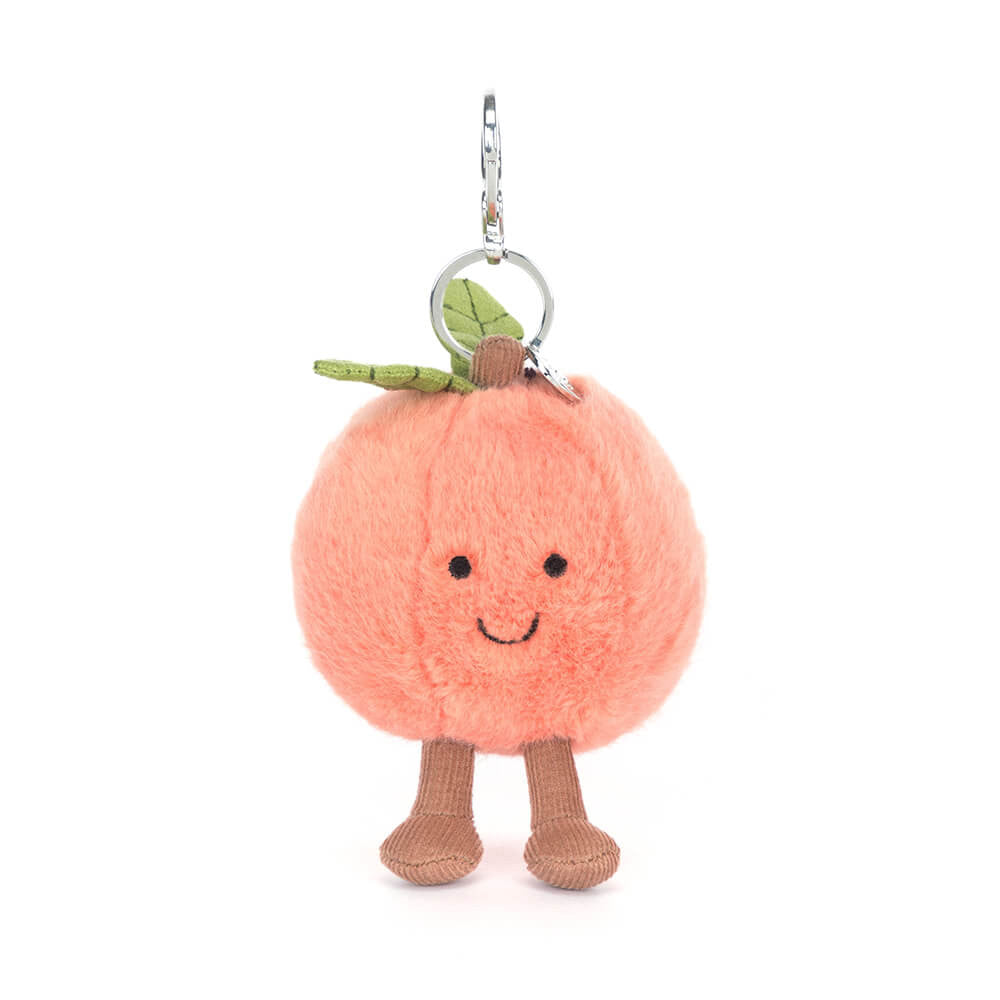 Adorable Amuseables Peach Bag Charm by JellyCat showing off its cheerful expression and plush texture, ideal for keychains or bag accessories.