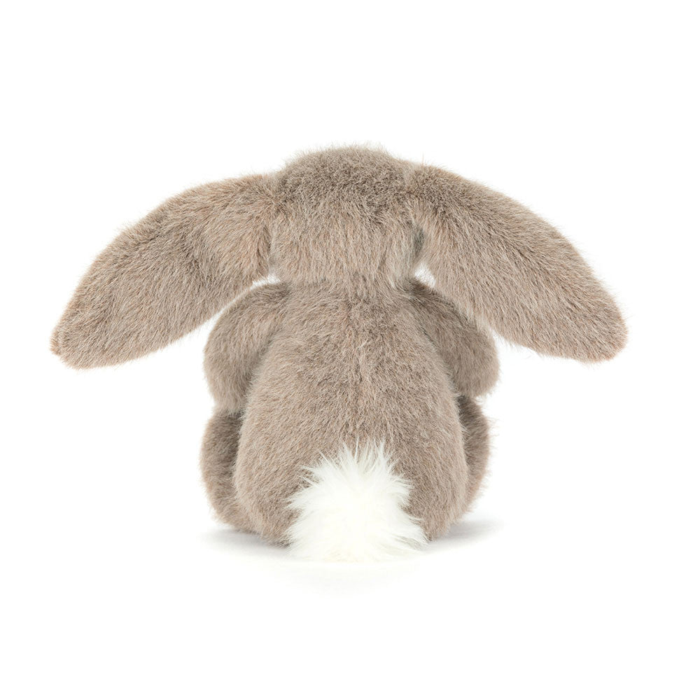 Back view of the Fawn Flufflet Bunny by JellyCat, highlighting its fluffy tail and soft fur.