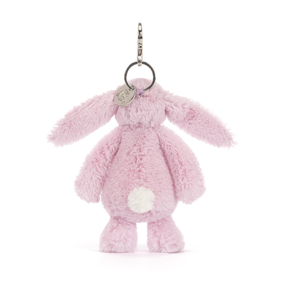 Thistlepop Blossom Bunny Bag Charm displayed on a table, highlighting the charming design for gifting.