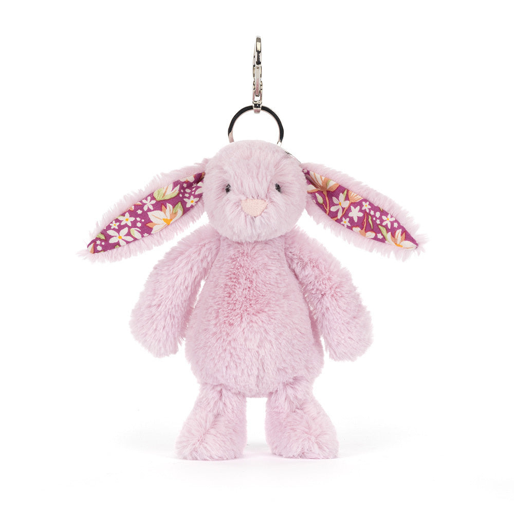 Close-up of Thistlepop Blossom Bunny Bag Charm showcasing its soft plush fabric and embroidered eyes.