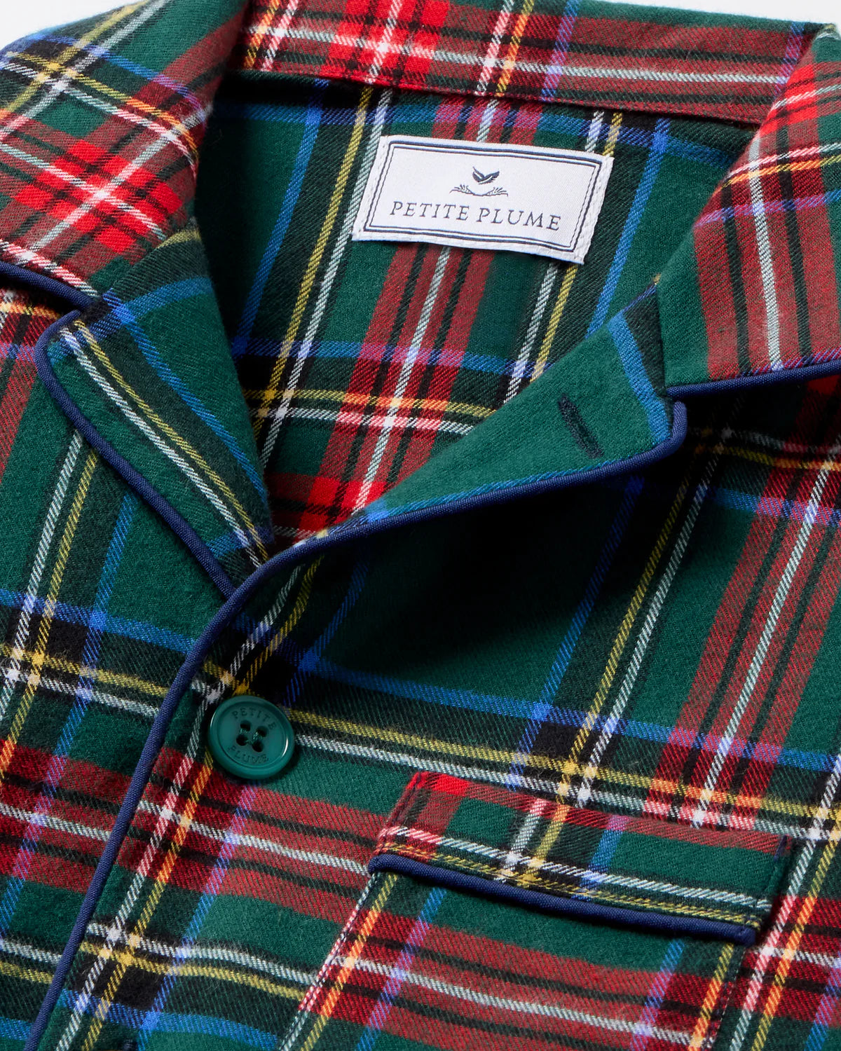 Close-up of the pattern on the Children's Brushed Twill Pajama Kensington Tartan featuring festive plaid design.