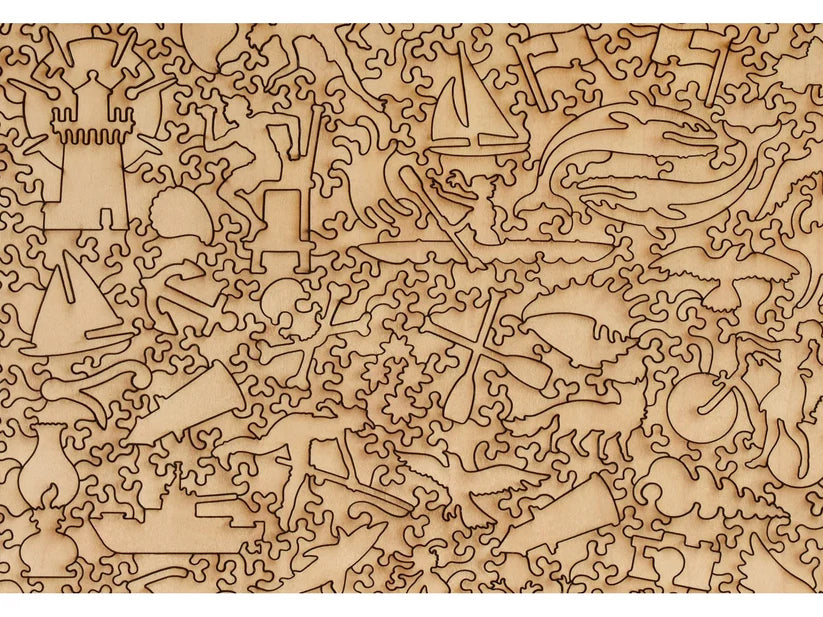 Close-up of wooden puzzle pieces showcasing various shapes and designs from the Cape Cod Xplorer Map Wooden Puzzle by Liberty Puzzles.