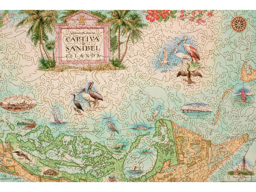 Close-up view of Captiva and Sanibel Islands wooden puzzle pieces by Liberty Puzzles, showcasing intricate designs and scenic elements.