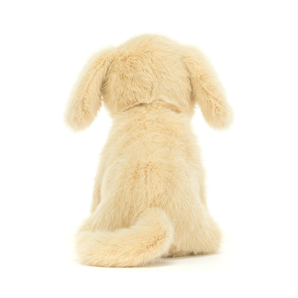 Back view of Golden Puppy toy by JellyCat, displaying its fluffy coat and cute tail, perfect for cuddling.