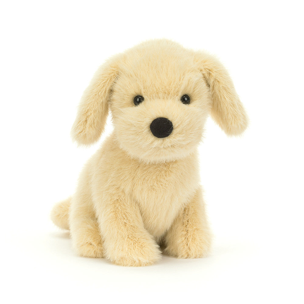 Golden Puppy plush toy from JellyCat, featuring a soft, fluffy texture and an adorable sitting pose with a friendly expression.