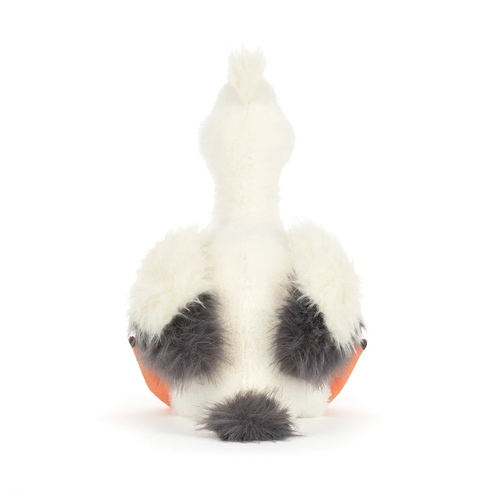 Life-like depiction of Keli Pelican SS26 alongside beach-themed props, ideal for themed gifts.