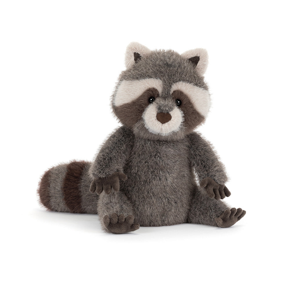 Trixiwoo Raccoon plush toy sitting beside a stack of books, perfect for imaginative play.
