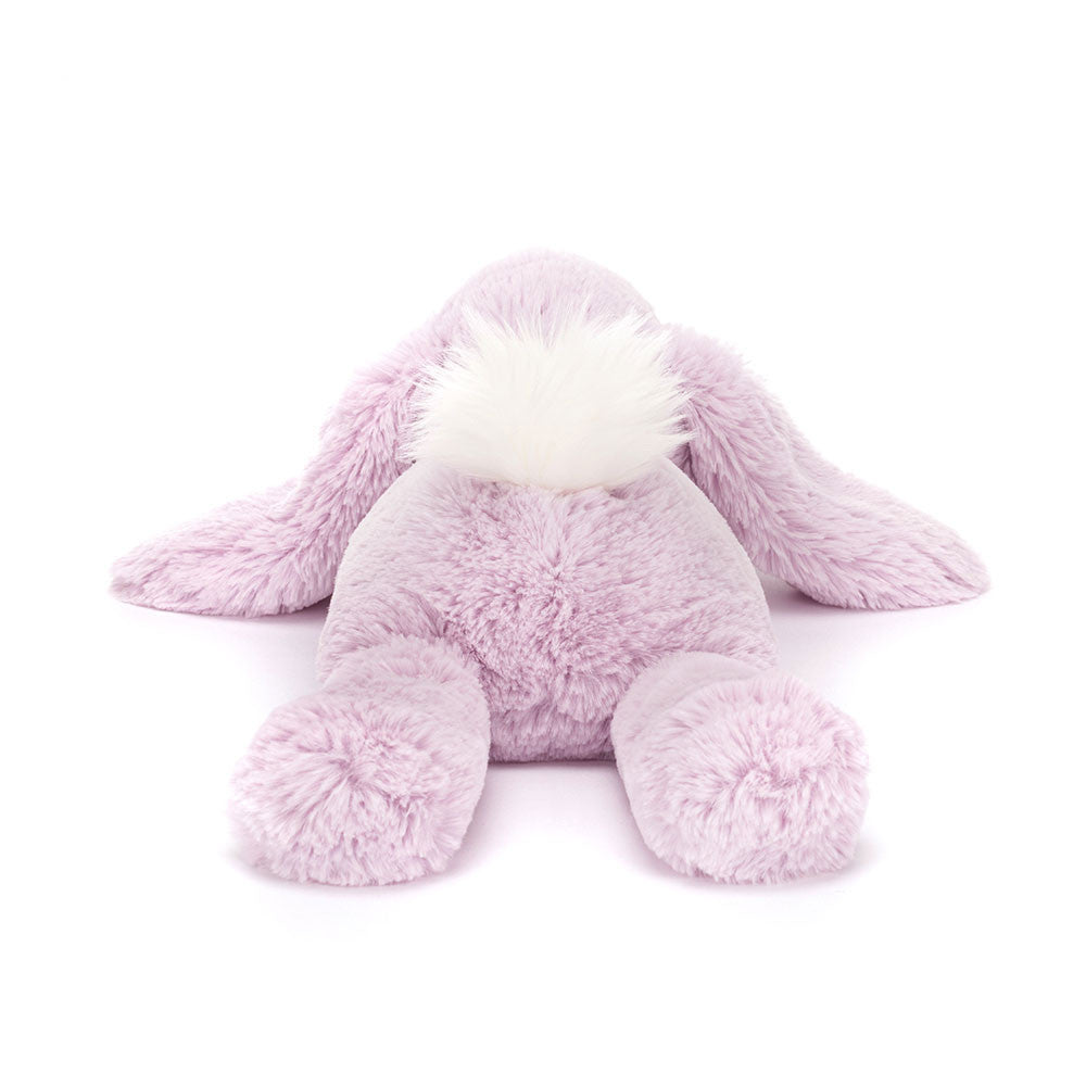 Back view of JellyCat Smudge Lavender Rabbit Plush Toy - 9.4in Soft Polyester Bunny with visible fluffy tail and paws, ideal for cuddling.