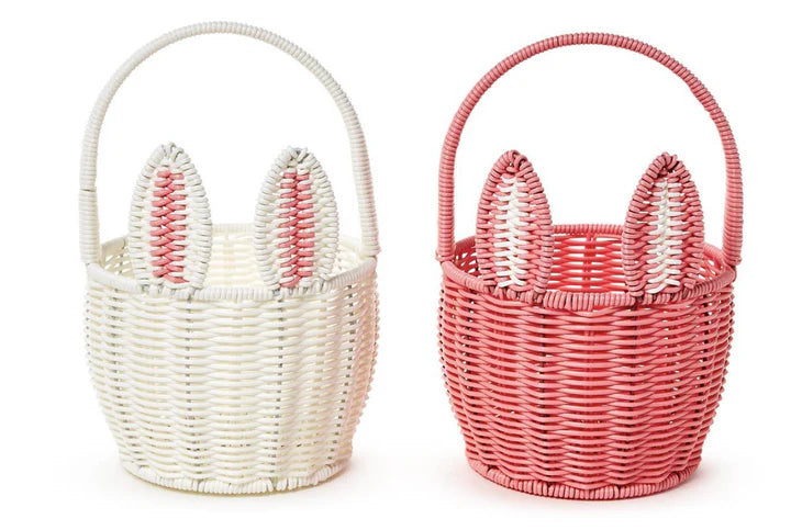 Two adorable faux wicker bunny baskets with prominent ears in white and pink colors from Cupcakes and Cartwheels, perfect for Easter hunts and decoration.