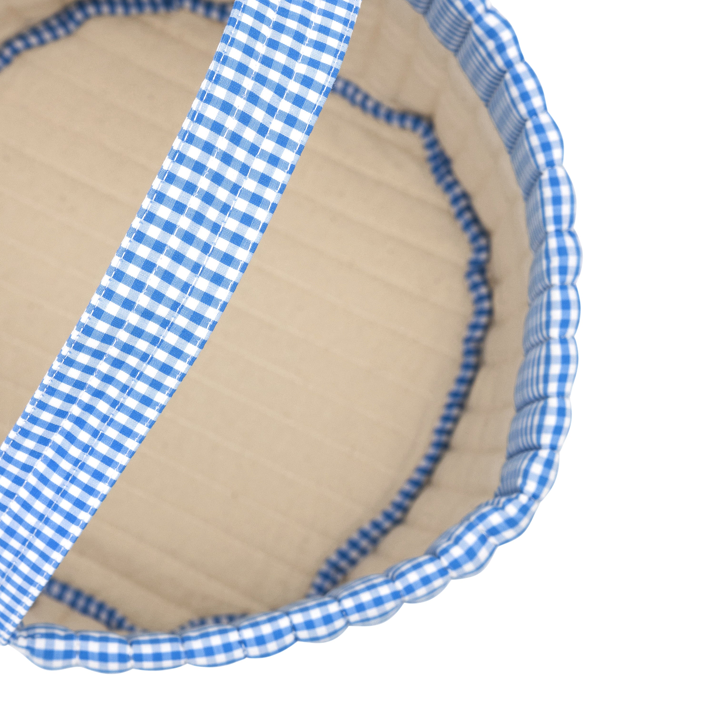 Inside view of the blue gingham Easter basket by Minnow, showcasing its sturdy construction and charming pattern, ideal for Easter festivities.