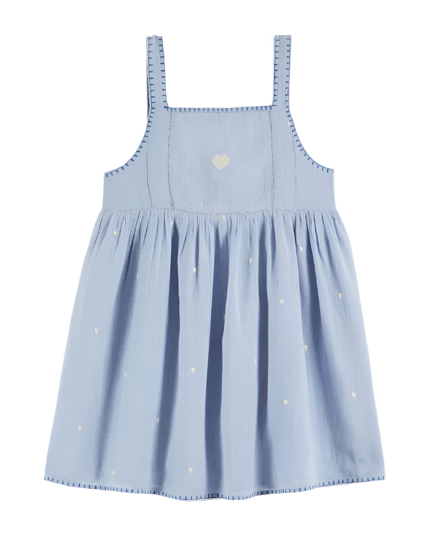 Light blue  dress from Emile Et Ida, featuring embroidered white hearts throughout. This PASTEL ROBE BRODEE COEUR ECUME has a large cross-stitched heart on the yoke and delicate detailing, perfect for little dreamers.