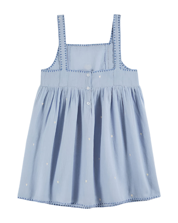 Back view of the light blue dress by Emile Et Ida, showcasing buttons and gathered skirt details. Ideal for romantic occasions, this PASTEL ROBE BRODEE COEUR ECUME is designed for comfort and style.