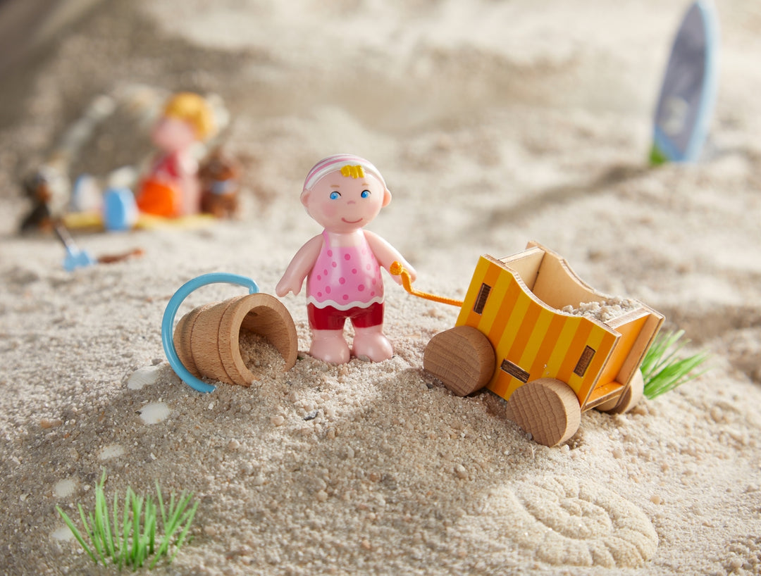 Haba Little Friends Baby Nora and Wagon Pocket Full of Posies